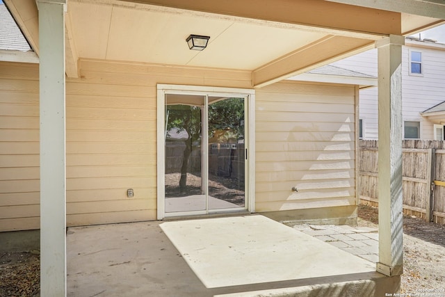 property entrance with a patio