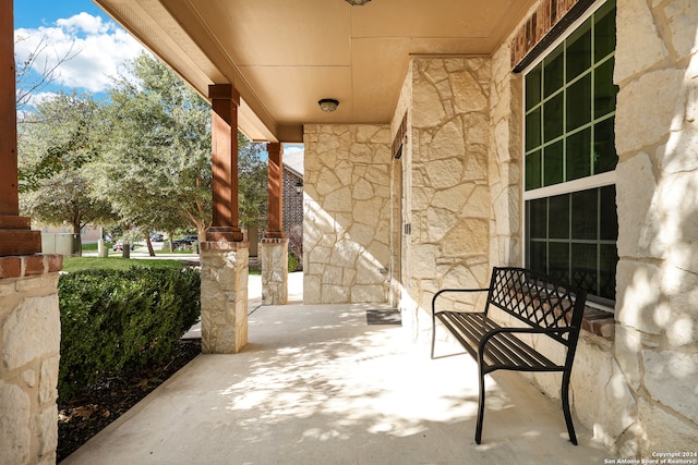 view of patio featuring a porch