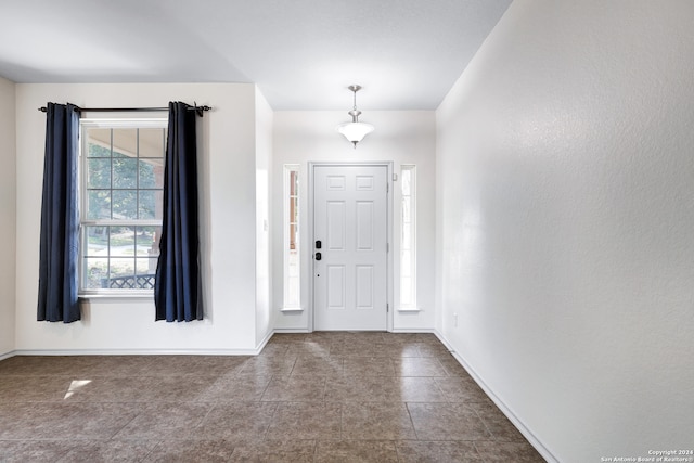 entrance foyer featuring tile patterned floors