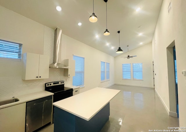 kitchen featuring stainless steel range with electric cooktop, high vaulted ceiling, white cabinets, wall chimney exhaust hood, and a kitchen island