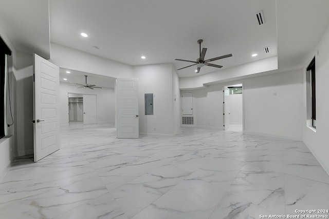 unfurnished room featuring electric panel and ceiling fan