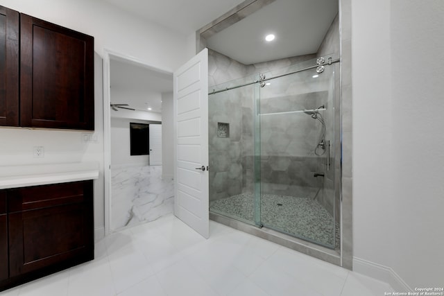 bathroom with vanity and an enclosed shower