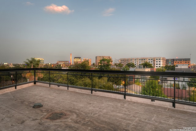 view of patio terrace at dusk