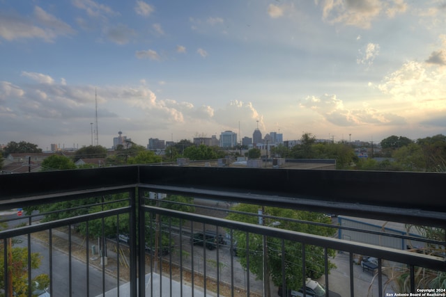 view of balcony at dusk