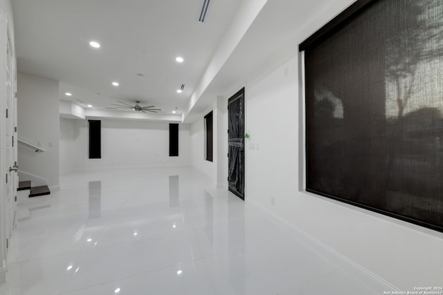 hallway with light tile patterned floors