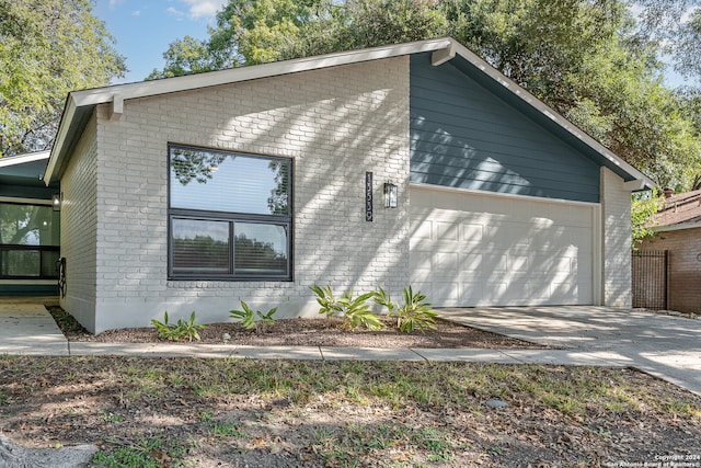 view of home's exterior featuring a garage