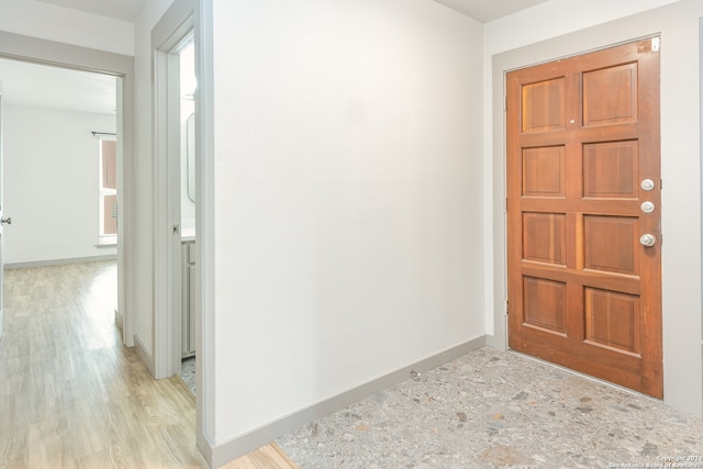 foyer with light hardwood / wood-style flooring