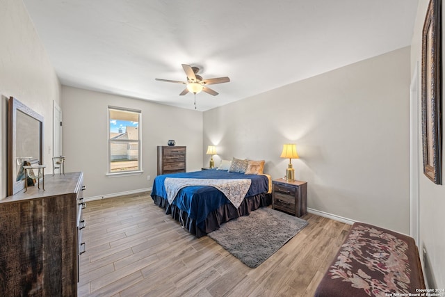 bedroom featuring ceiling fan and light wood-type flooring