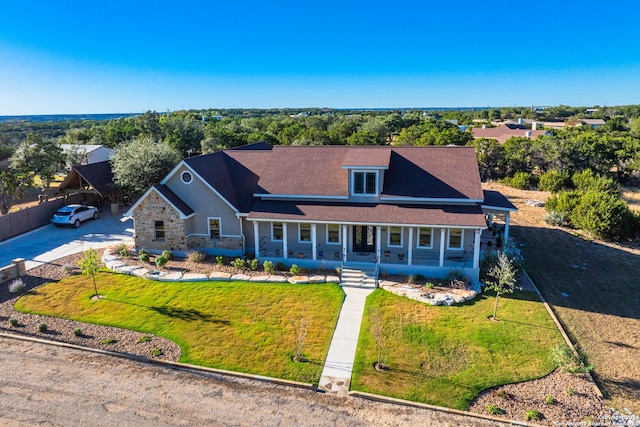 view of front of home featuring a porch and a front yard