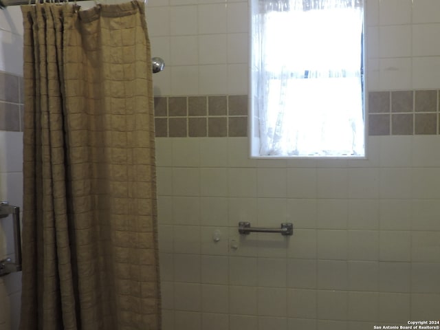 bathroom with walk in shower