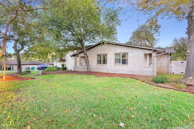 exterior space featuring a lawn