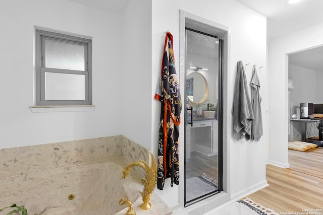 bathroom featuring wood-type flooring