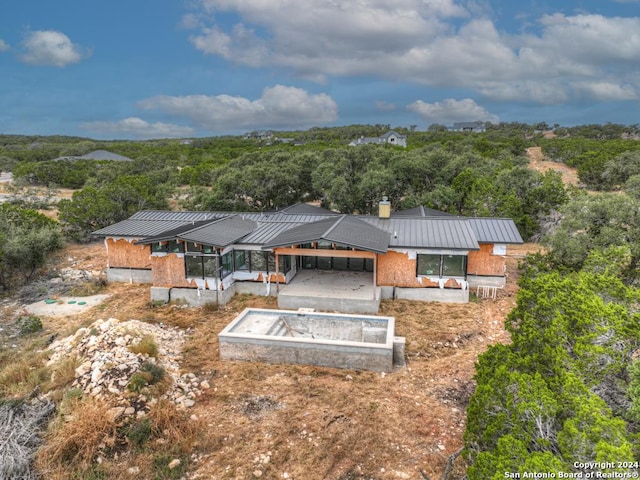 1722 Paradise Pkwy, Canyon Lake, TX 78133 - aerial view of property and surrounding area with a heavily wooded area