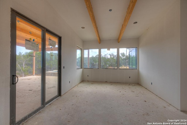1722 Paradise Pkwy, Canyon Lake, TX 78133 - unfurnished sunroom with healthy amount of natural light and beamed ceiling