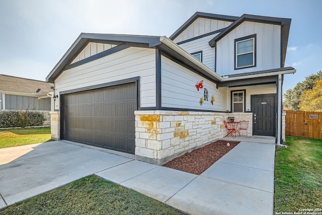 view of front of property with a garage