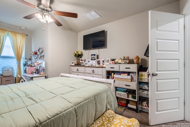 carpeted bedroom featuring ceiling fan