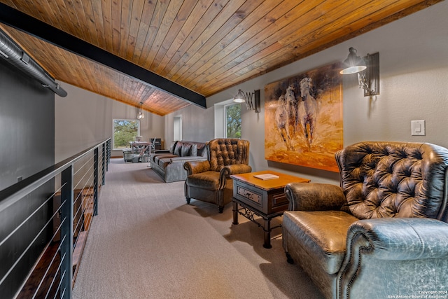 sitting room featuring carpet flooring, vaulted ceiling with beams, and wood ceiling