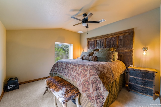 bedroom featuring ceiling fan, carpet floors, and vaulted ceiling