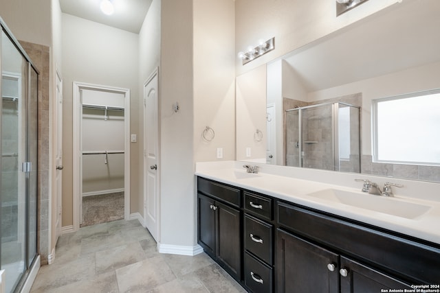 bathroom featuring vanity and walk in shower