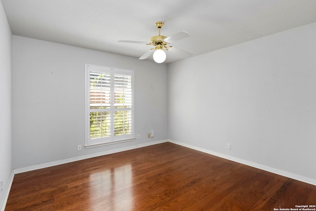 unfurnished room with hardwood / wood-style floors and ceiling fan