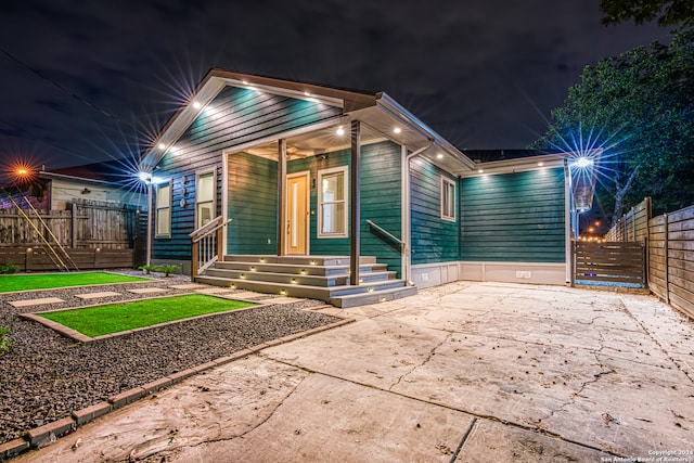 view of front of house with a patio