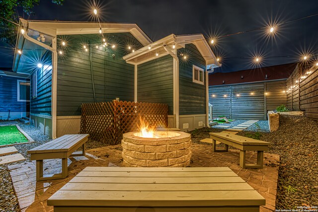 exterior space with a fire pit