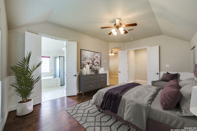 bedroom with ceiling fan, dark hardwood / wood-style flooring, and lofted ceiling