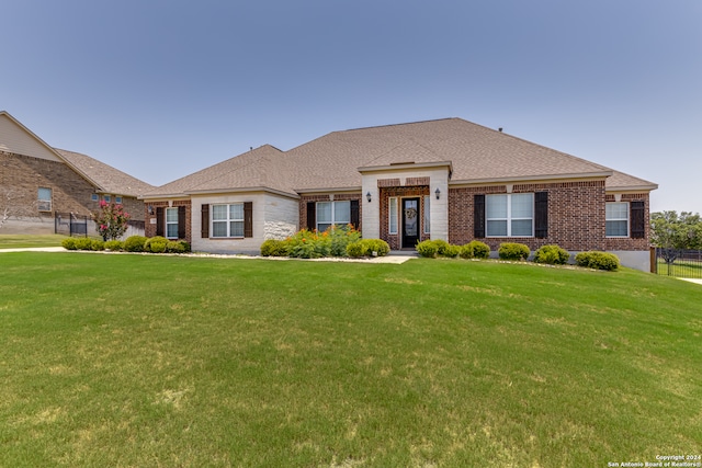 view of front of home with a front yard