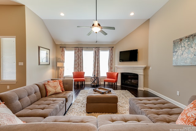 living room featuring wood-type flooring, high vaulted ceiling, and ceiling fan