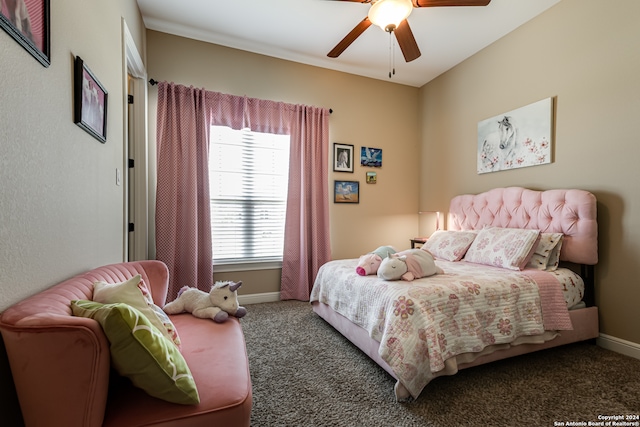 carpeted bedroom with ceiling fan