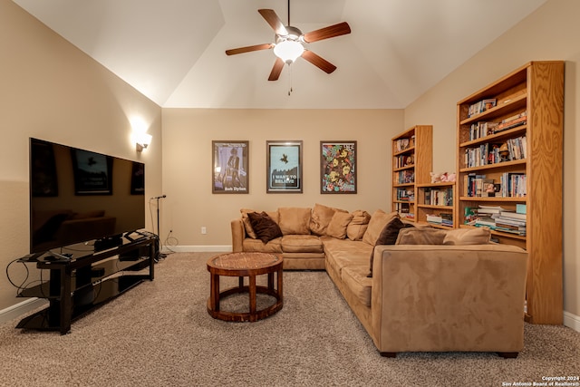 carpeted living room with ceiling fan and lofted ceiling