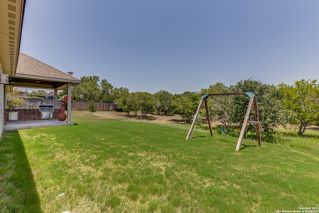 view of yard featuring a playground