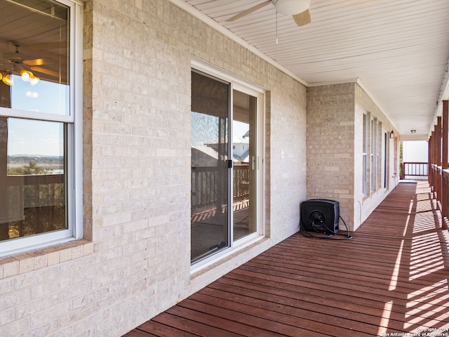 wooden deck with ceiling fan