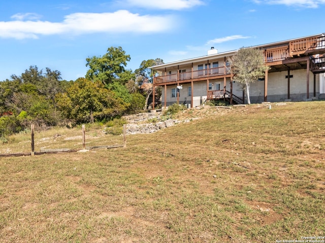 view of yard with a wooden deck