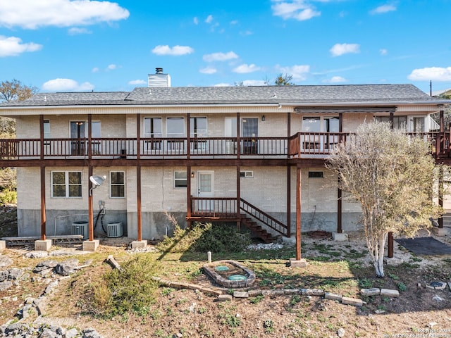 back of property with central air condition unit