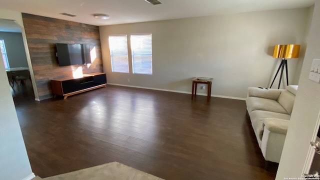 living room with dark wood-type flooring