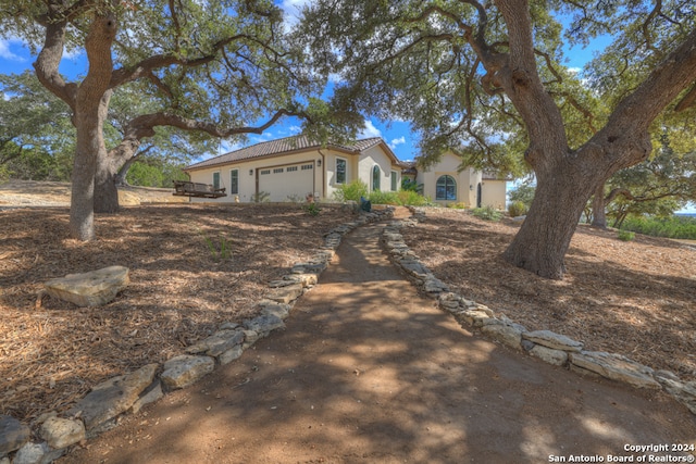 view of front of property featuring a garage