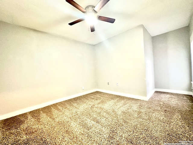 unfurnished room with carpet flooring and ceiling fan