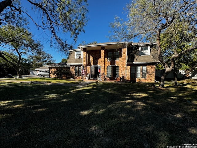 view of front of property with a front lawn