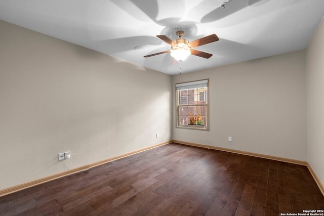 unfurnished room with hardwood / wood-style flooring and ceiling fan