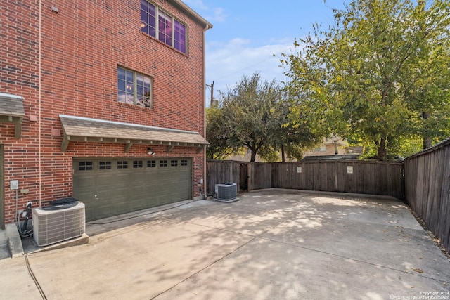 view of side of home featuring cooling unit