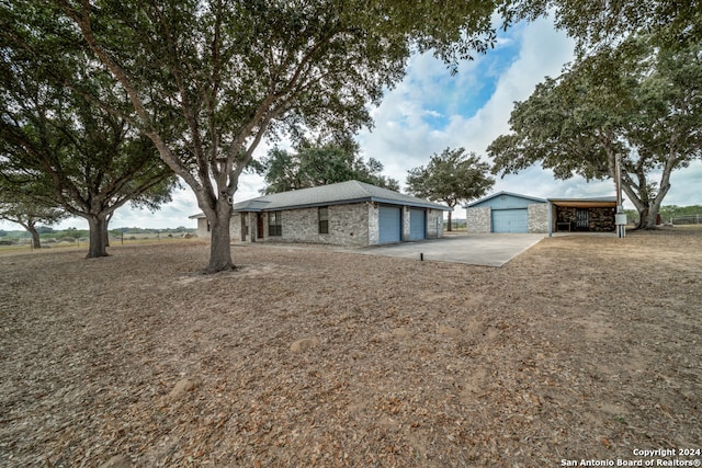 view of front of home with a carport