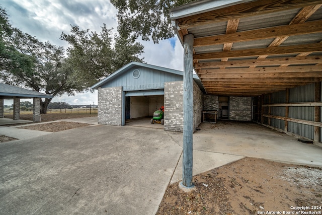 garage with a carport