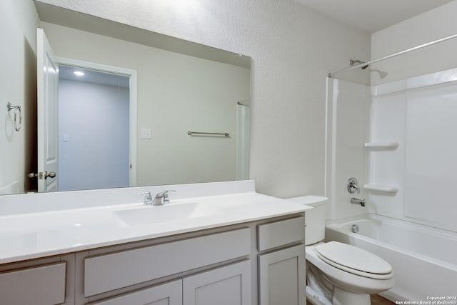 full bathroom featuring vanity, toilet, and shower / tub combination