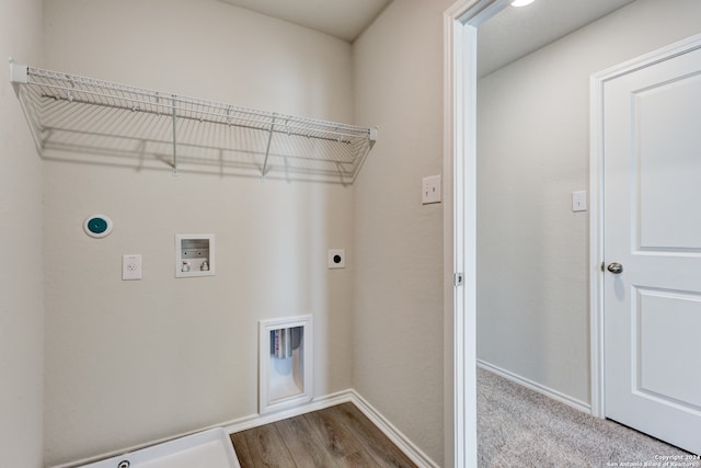 laundry room featuring hookup for an electric dryer, washer hookup, hardwood / wood-style flooring, and hookup for a gas dryer