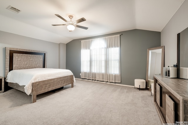 carpeted bedroom featuring ceiling fan and lofted ceiling