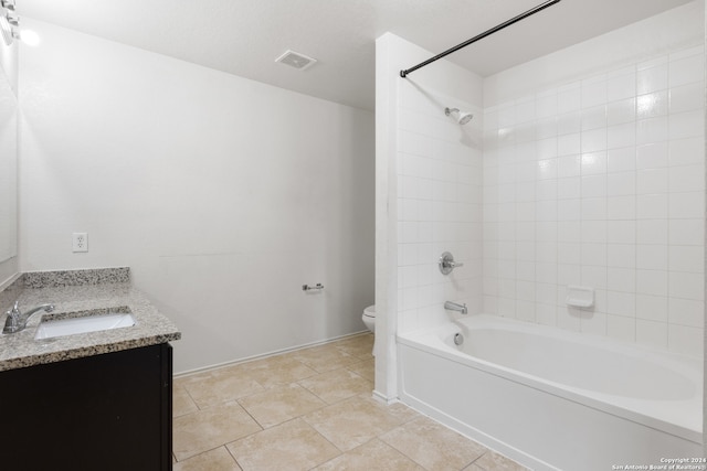 bathroom featuring toilet, shower / bathtub combination, visible vents, and vanity