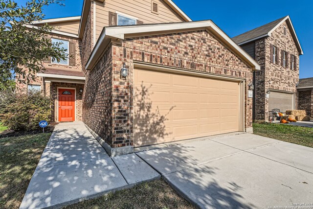 front of property featuring a garage