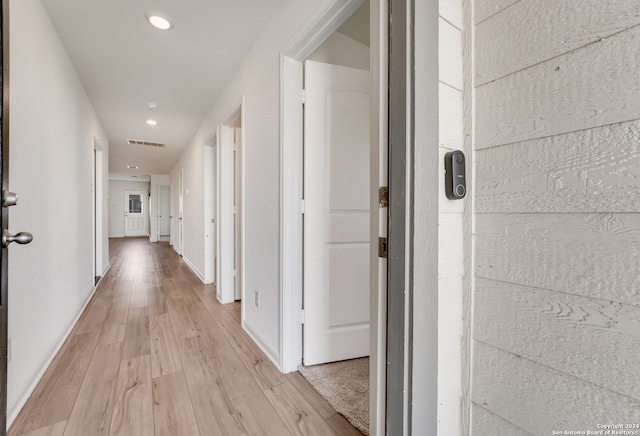 corridor featuring light hardwood / wood-style flooring