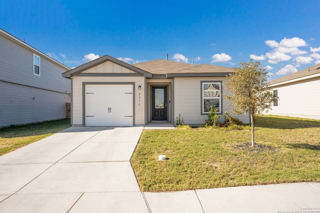 single story home featuring a front yard and a garage